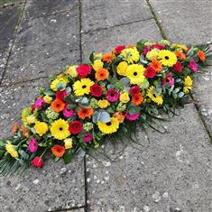 Gerbera Parade Casket Spray Tribute